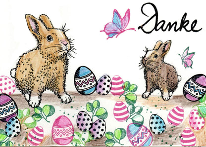 Stempel Kaninchen steht und Karotte